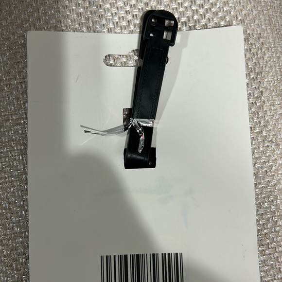 Luggage tag. It says COFFEE FIRST - Picture 2 of 3